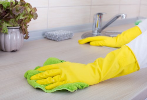 Deep cleaning of a corner sofa in a Merton living room