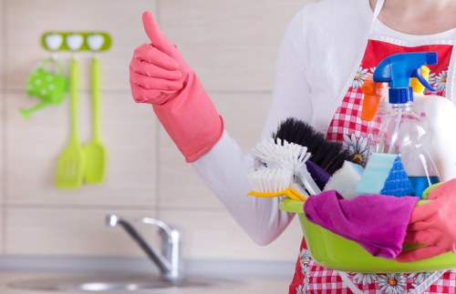 Commercial cleaners carrying out deep cleaning in a Merton workplace